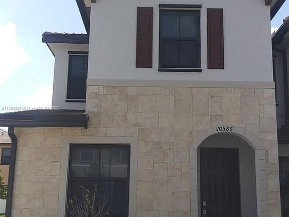 2nd image of 10586 W 32nd Ln #10586