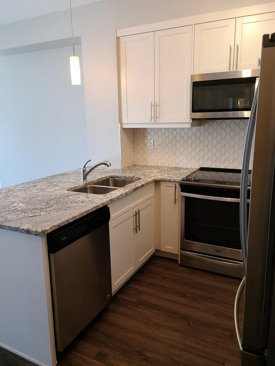 Building Photo - 300 Auburn Meadows Mnr SE #206