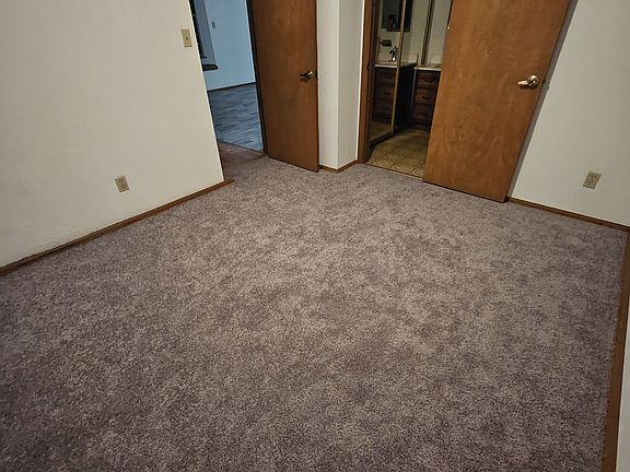 Bedroom with new carpet