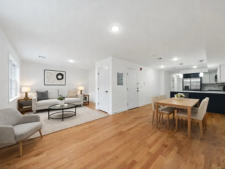 Living/Dining/Kitchen Area (virtually staged)