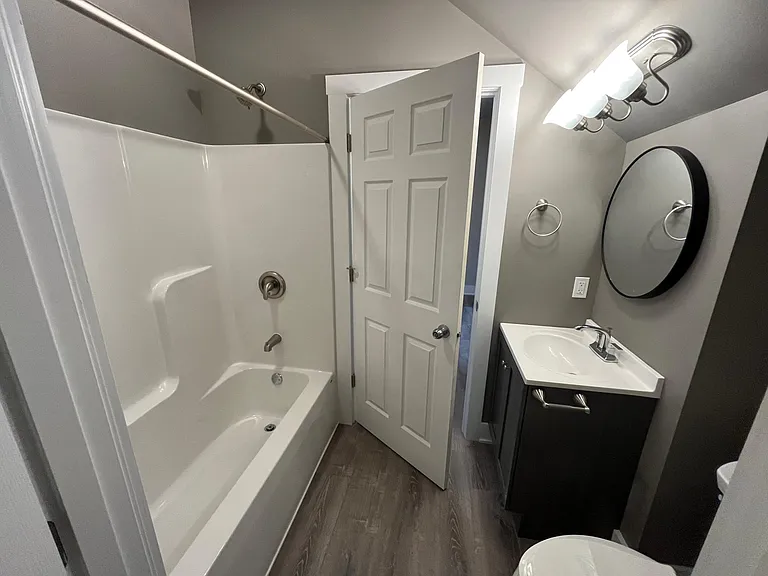 full bath accessible from small bedroom and dining room access as well