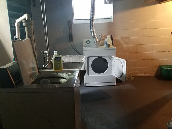 Basement with washer and dryer connections