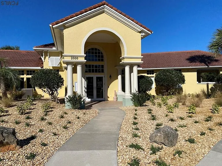 Clubhouse with common area, pool bathrooms and gym.