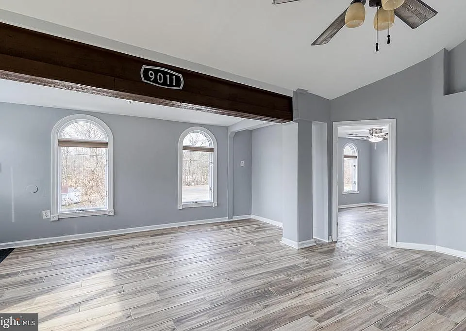 Living/dining room with lots of natural light