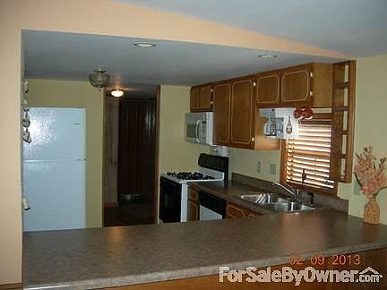 44 Cornet Court Kitchen View
						:
						Peach Valley Club-Ft. Valley, GA