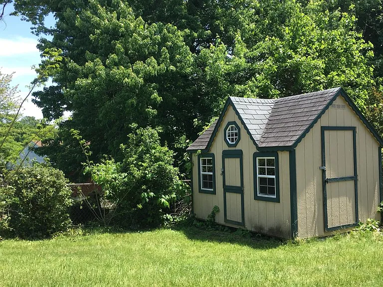 Small shed to store lawn mower, bikes or other items.