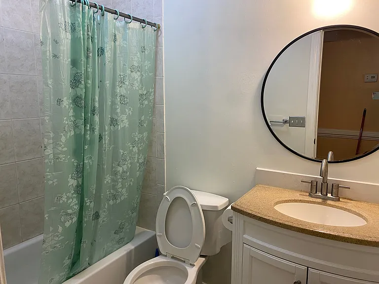 Full guest bathroom conveniently located near secondary bedrooms