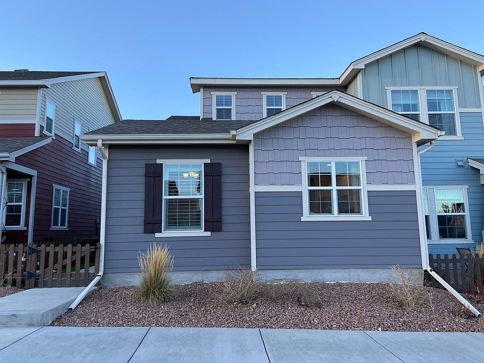 Front of the townhome. Units are separated in groups of three. Share one interior firewall.