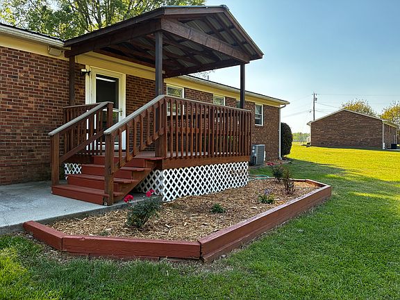 Back of house with viewing back porch