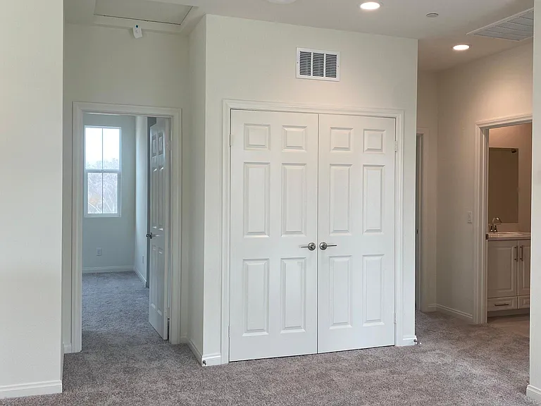 2F Den area- facing laundry closet
