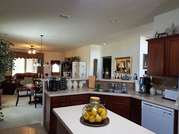 Island kitchen with Corian countertops