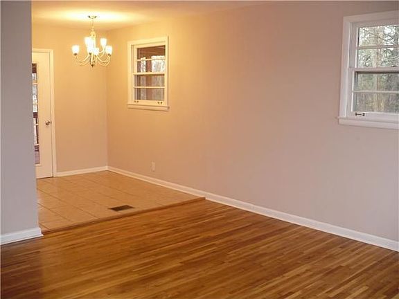 Completely renovated!! Solid Original Hardwoods, Fresh Paint,Modern Lighting