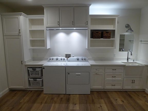custom laundry room w/ new LG washer and dryer