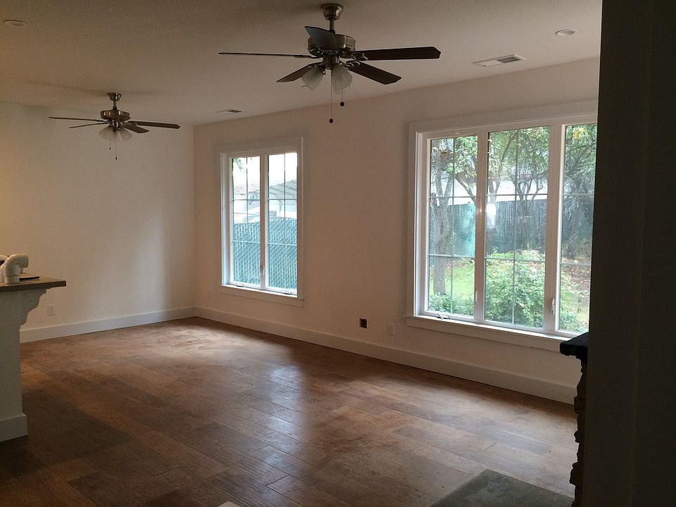 Large living room with wood stove