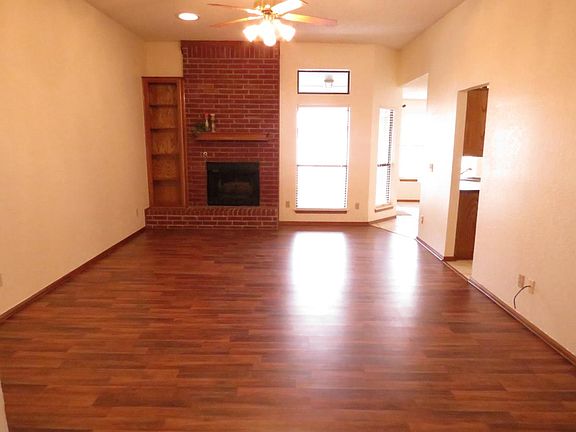 Main Living Room with brick fireplace