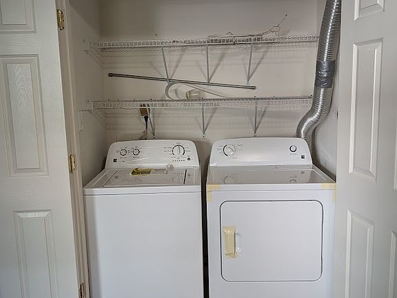 washer and dryer in basement