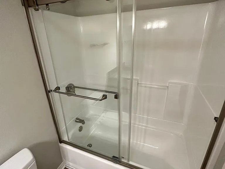 Primary shower with glass doors