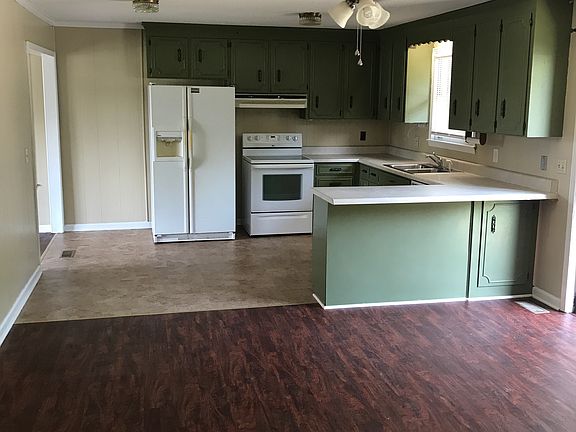 Kitchen opens to Den