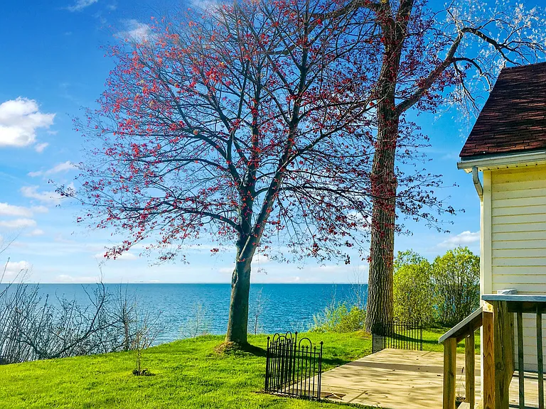 Fully furnished includes most utilities waterfront full house directly on Lake Ontario, 20 minutes from Niagara Falls and the new Amazon Distribution Center in the Town of Niagara.