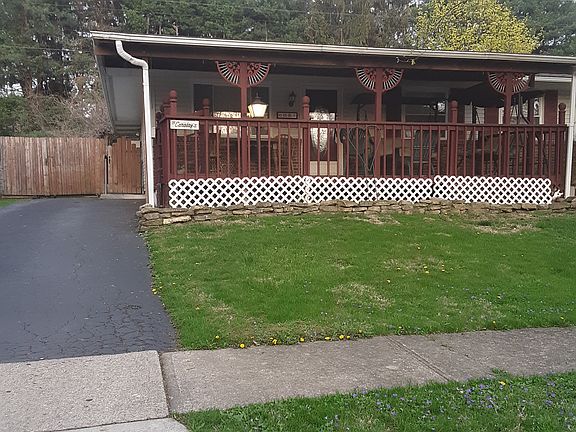 Covered deck front home 