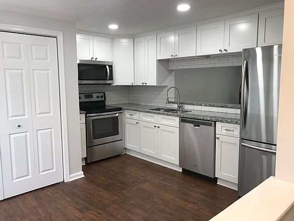 Kitchen with eat-in space for table and chairs