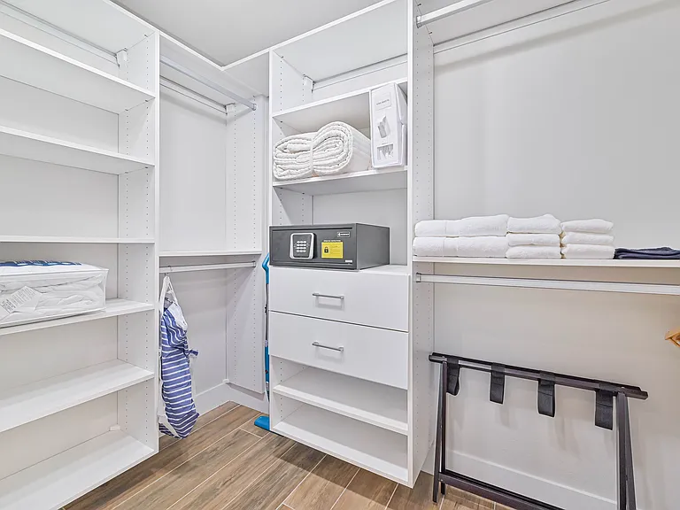 Primary loft bedroom walk in closet