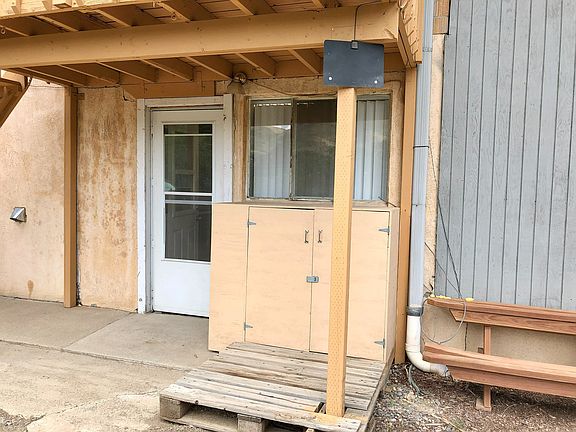Experience the warm welcome of this cozy apartment entrance.