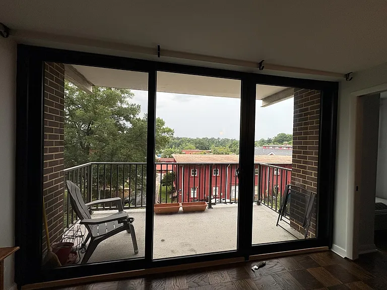Updated balcony doors (curtains included).