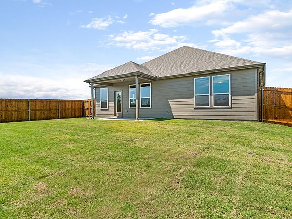 New Construction Spacious, fenced-in backyard with covered patio