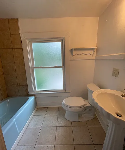 317 E 3rd St — Photo 7