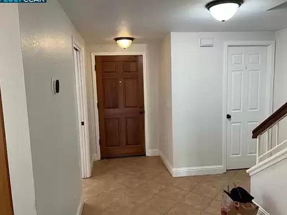 Entrance Lobby (Powder room door on rigth)