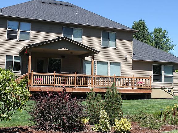 Backyard with deck and hot tub