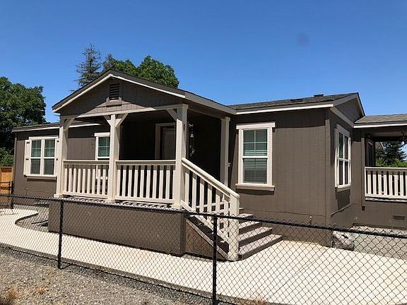 Front entry - front porch, side porch off kitchen, and outside sitting area to far left.