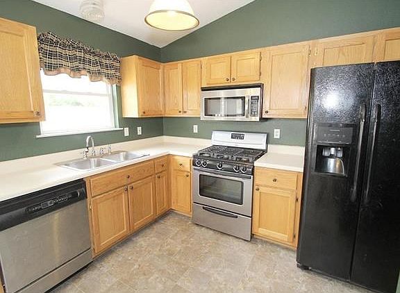 You will love cooking on the gas stove! Refrigerator stays!!