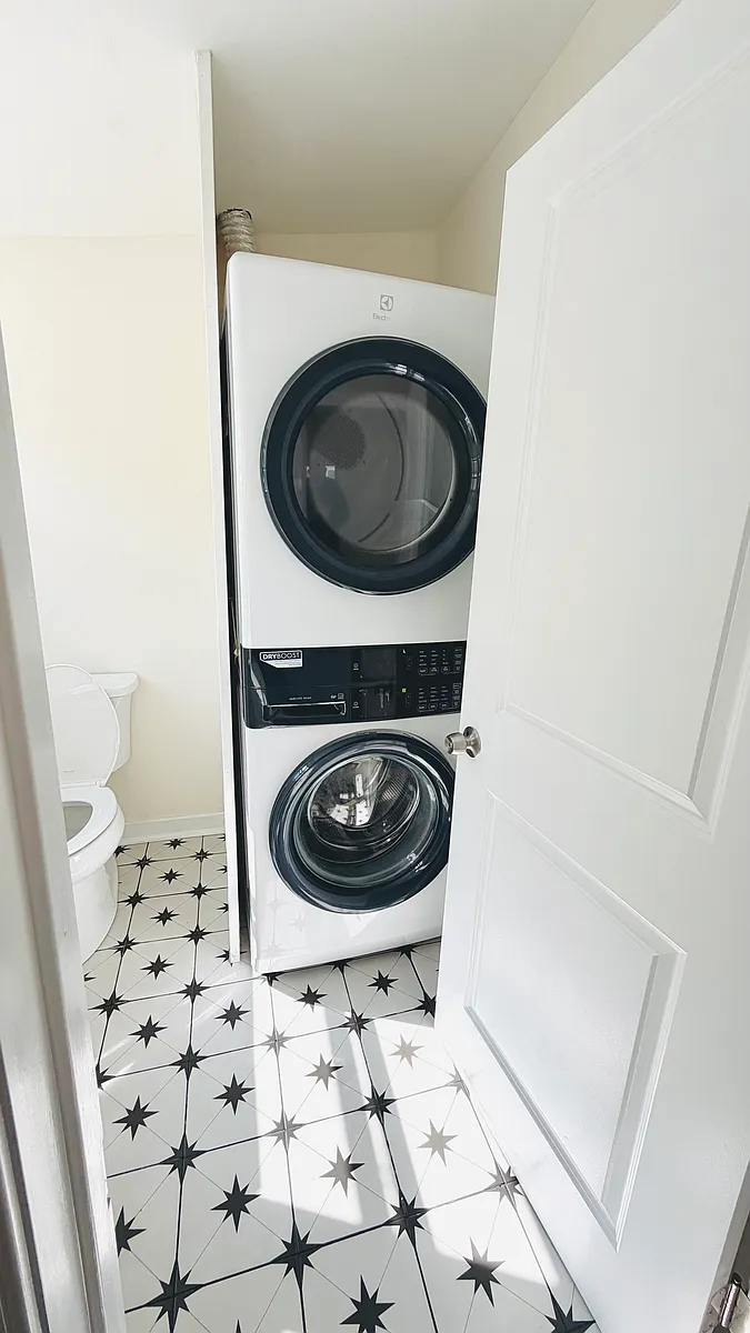 Electrolux stacked front-load washer and dryer with DryBoost technology _ no laundromat trips needed. - 7136 Bryan St