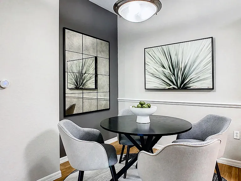 Separate dining area perfect for entertaining, featuring an open layout to the kitchen and living areas.