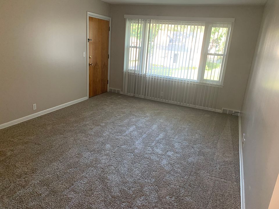 Living room with large picture windows that open!