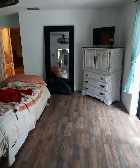 Master bedroom opens to the back deck and sunset views