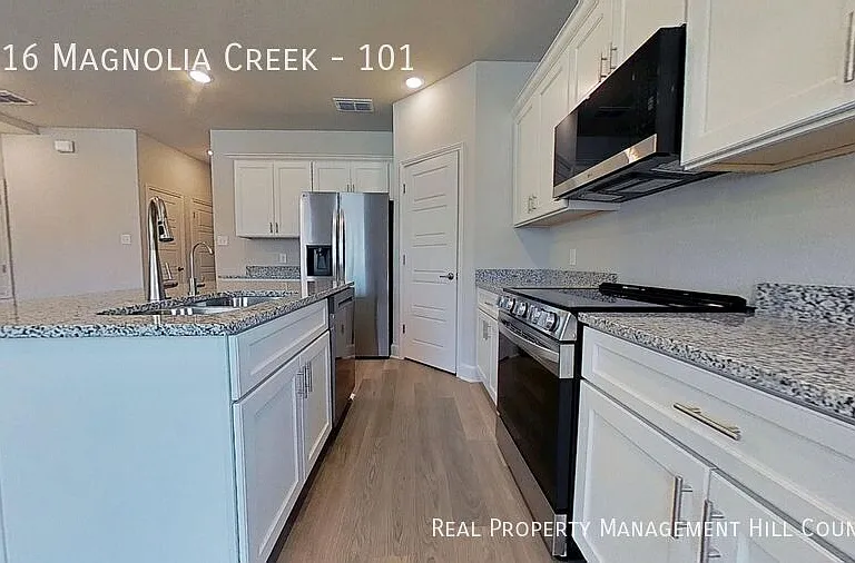 7216 Magnolia Vlg #101 — Photo 4