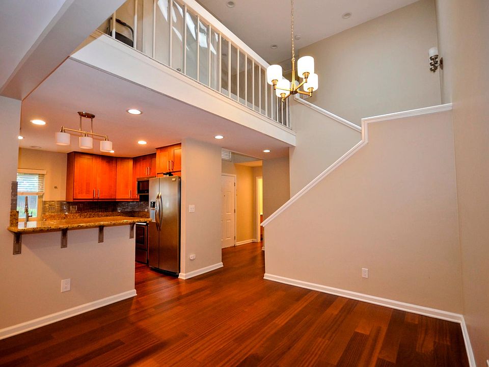Dining area, kitchen and stairwell