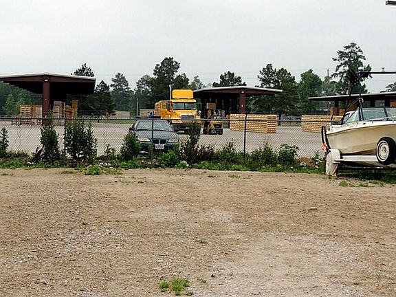 Pallet making business behind property.