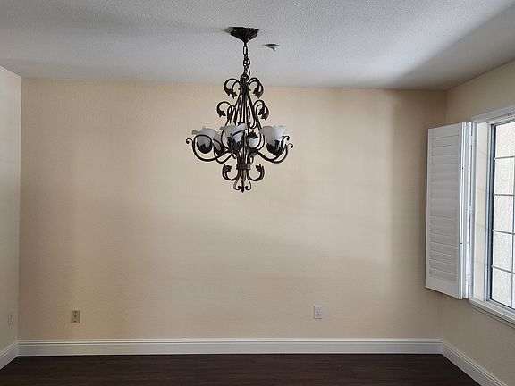 Dining room with gorgeous chandeliers throughout home