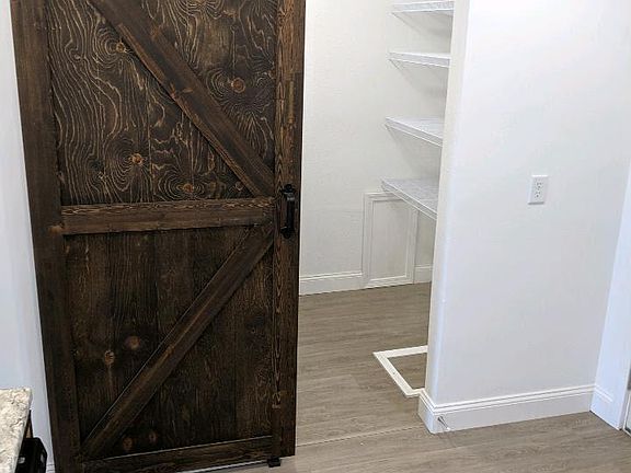 Pantry beside kitchen