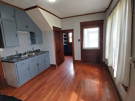 KITCHEN, NO APPLIANCES ARE FURNISHED.