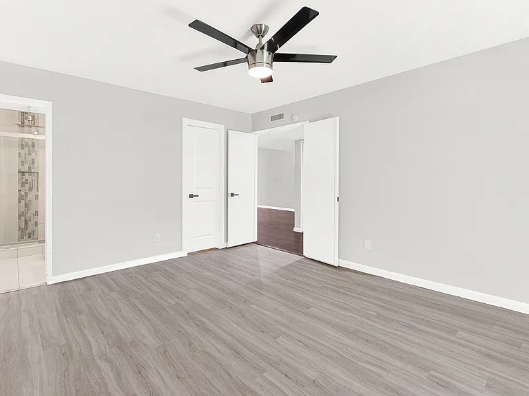 Primary bedroom has a walk-in closet and en suite bathroom.