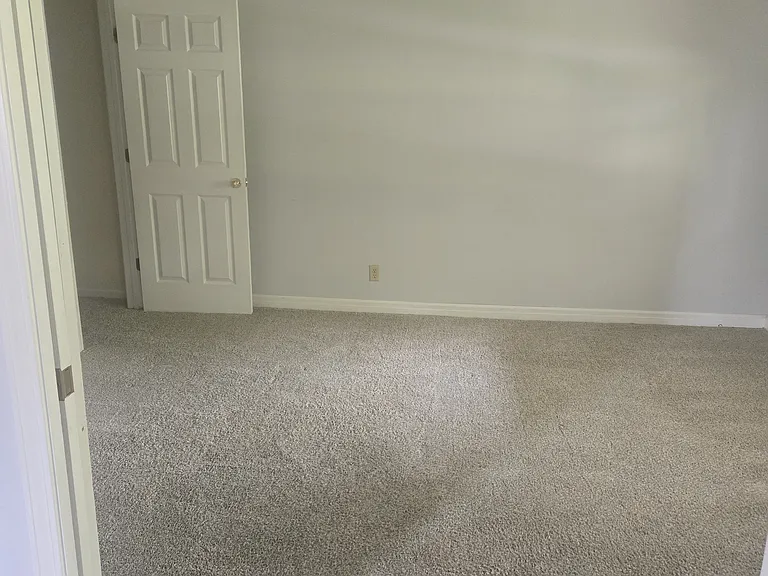 1st floor bedroom with pocket doors and large closet
