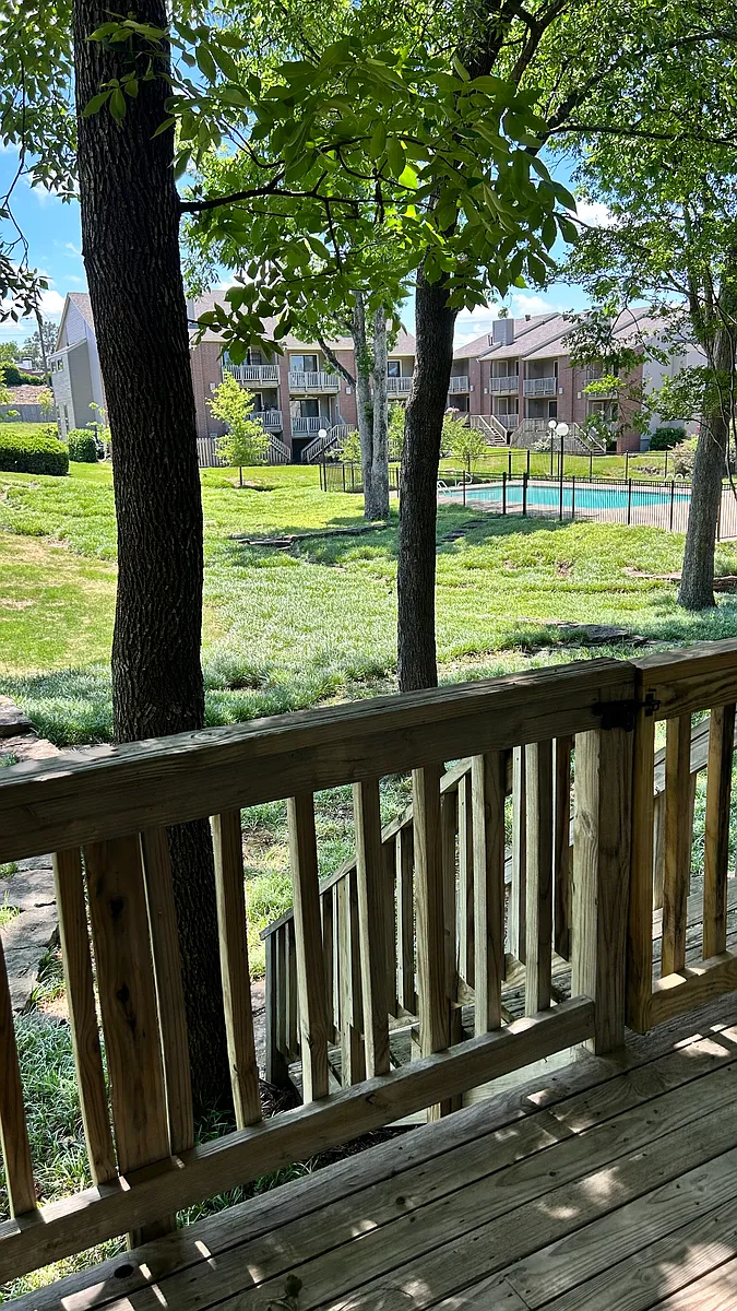 Back Deck extends entire width of condo and has a view of the community pool. - 2824 Foxcroft Rd #34