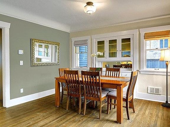 Dining room and living room with fireplace