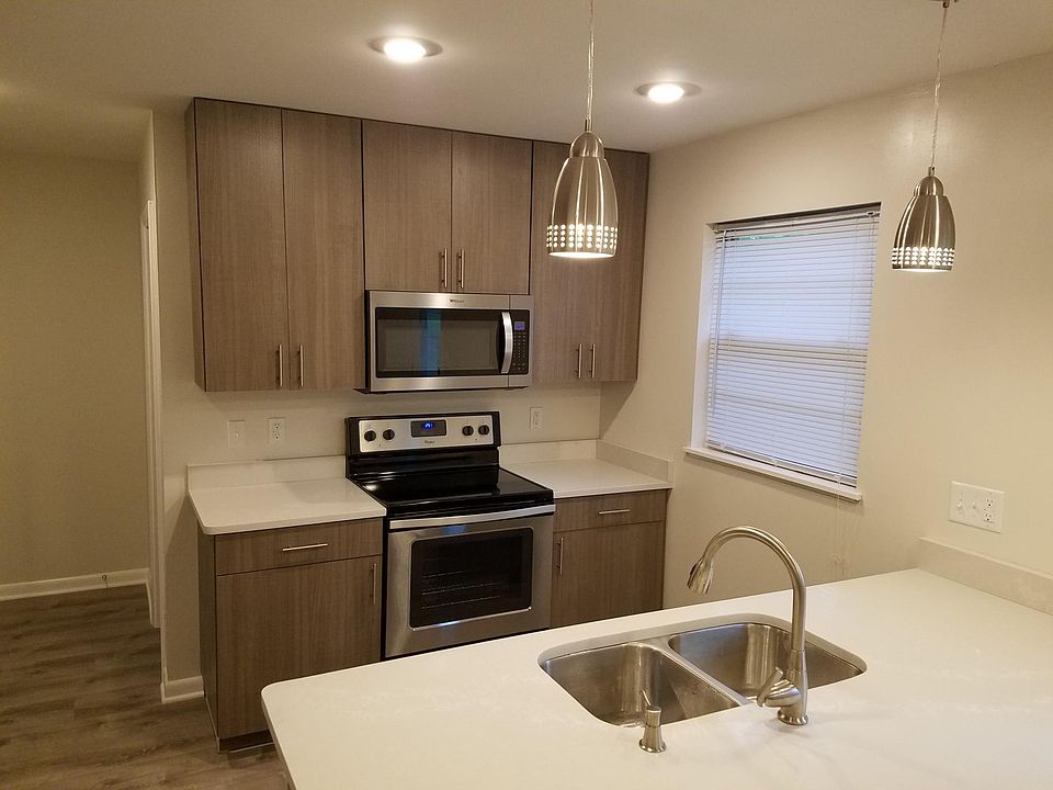 Kitchen with quartz countertops.