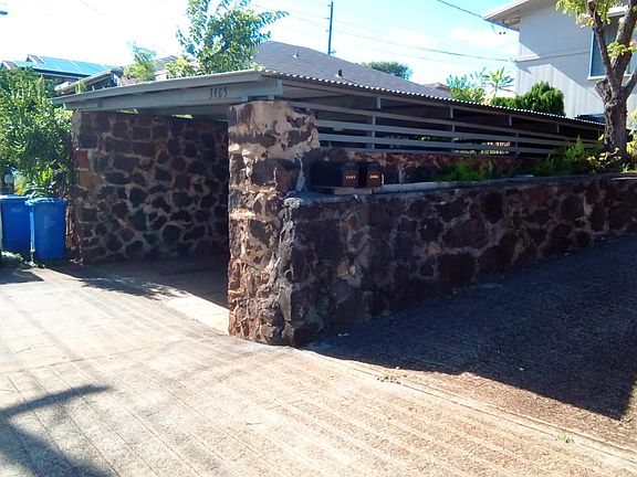 Shared Covered Carport (Rental includes parking for one stall). Street Parking available.